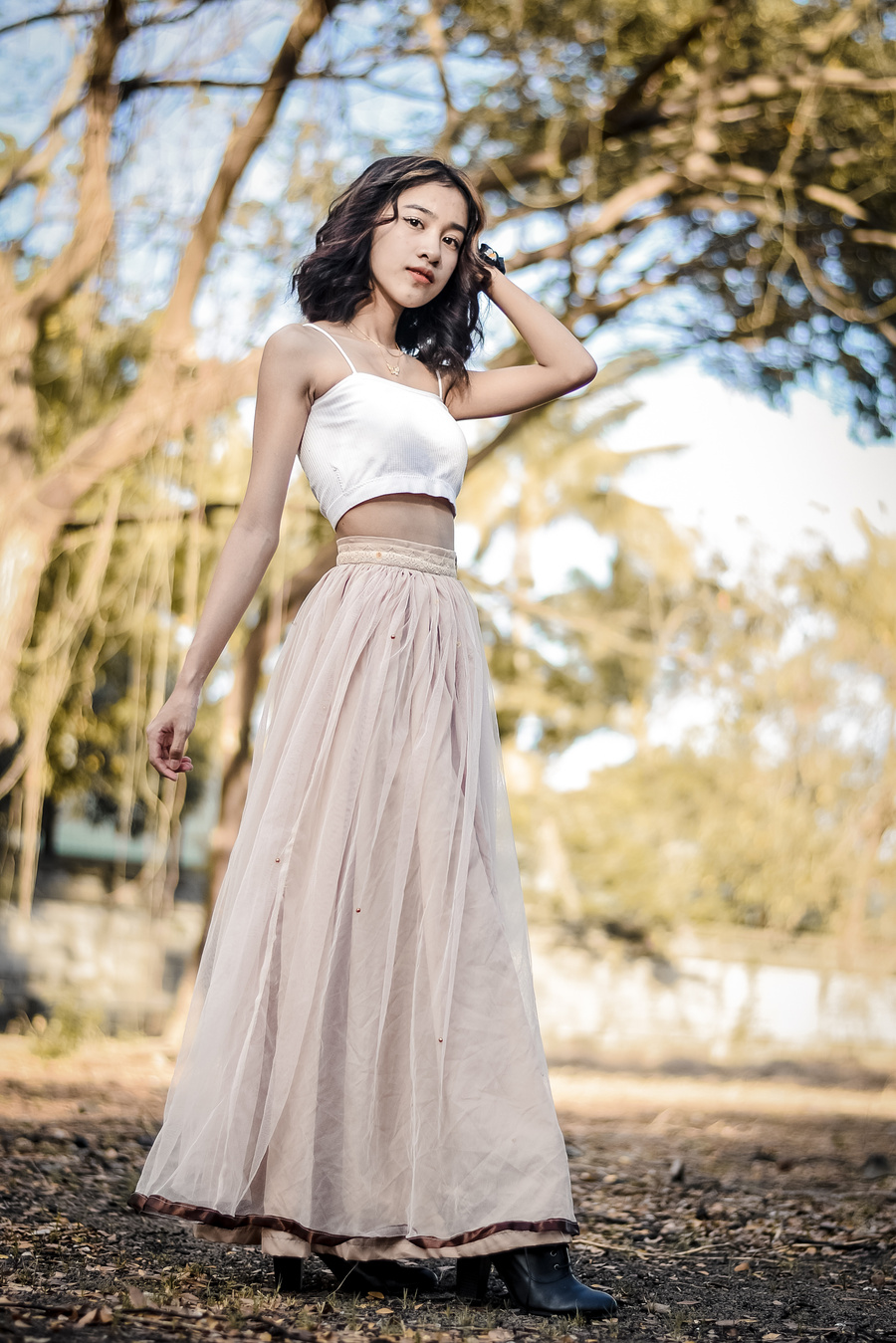 A Young Woman in a Long Skirt