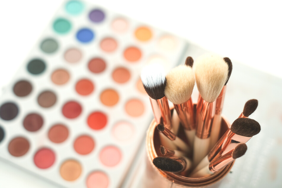 Different Types of Brushes  in Container and Eyeshadow Palette