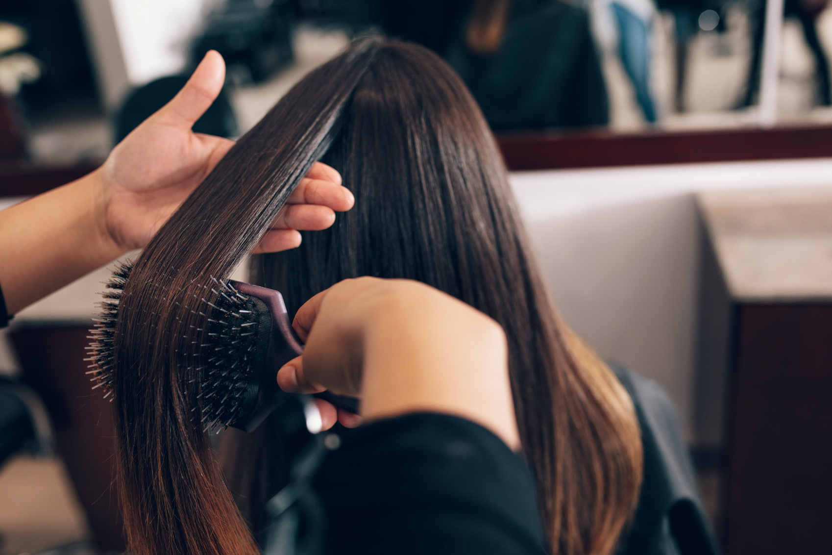 Female Hair Stylist Working 