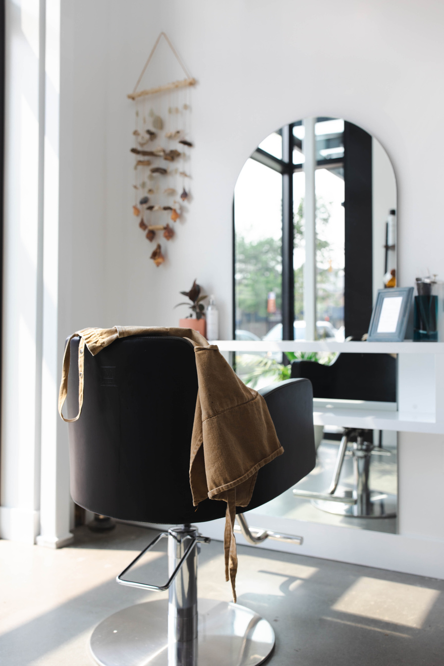 Modern Salon Interior with Chair and Mirror